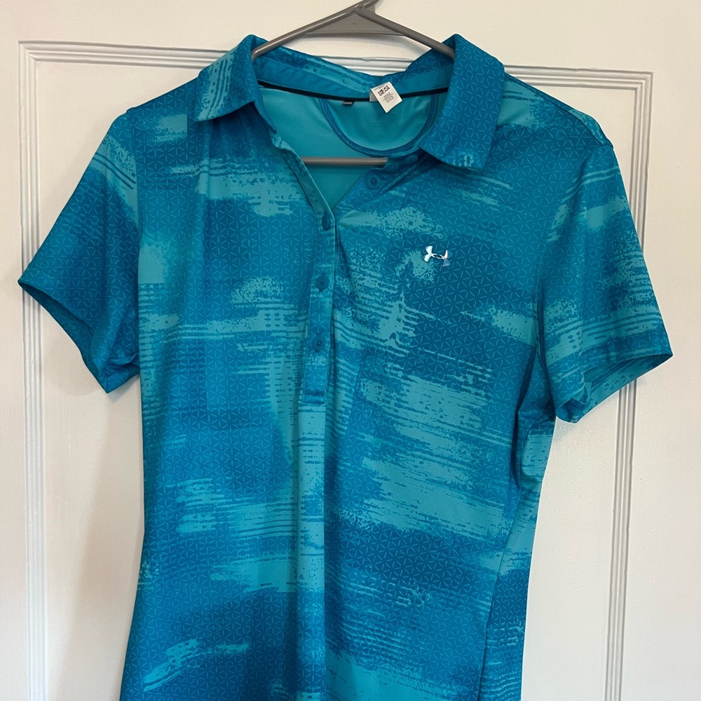 Under Armour women’s golf shirts. 2 for 1 size medium on both. NWOT